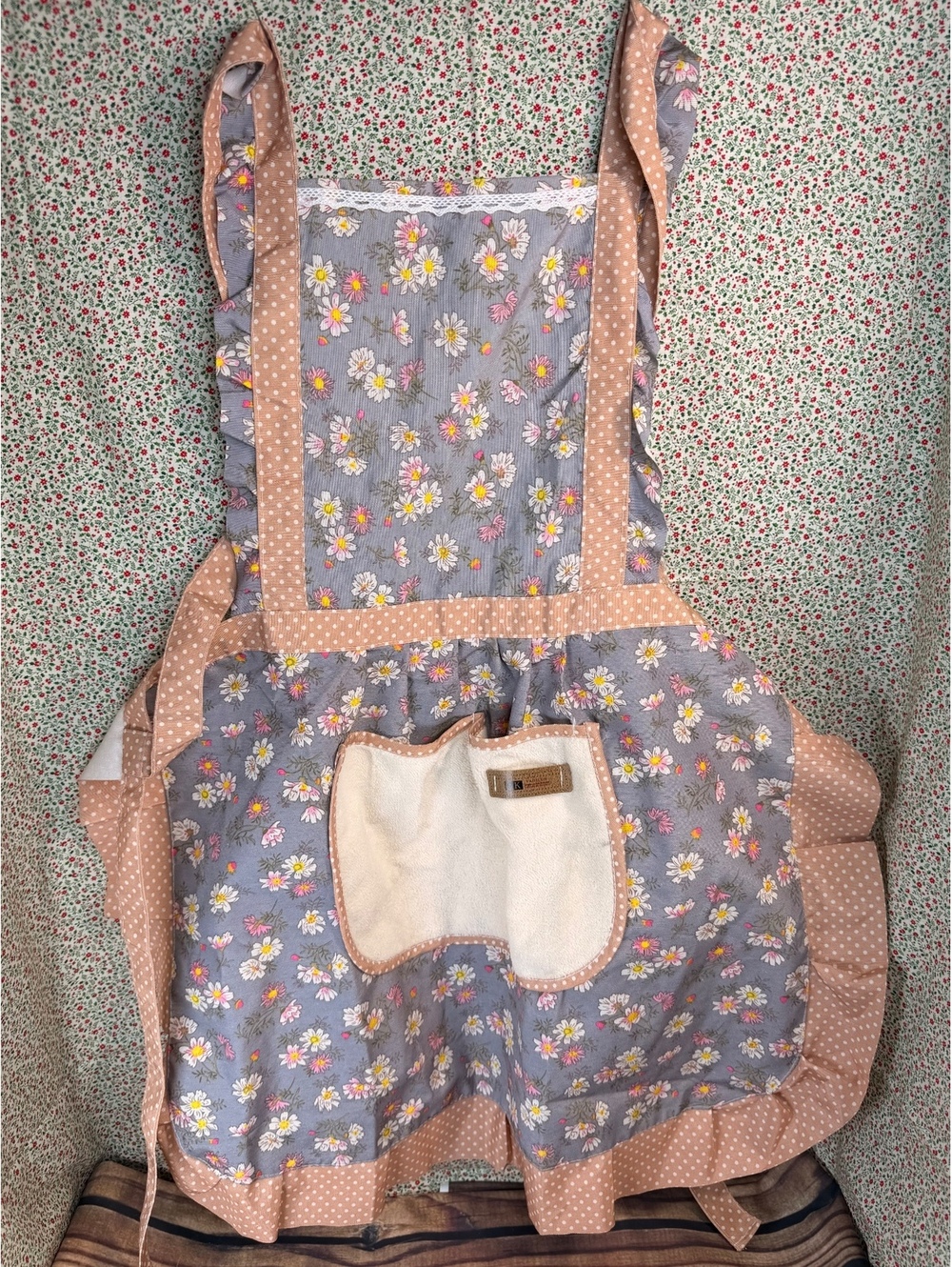 Floral apron with pink gingham trim